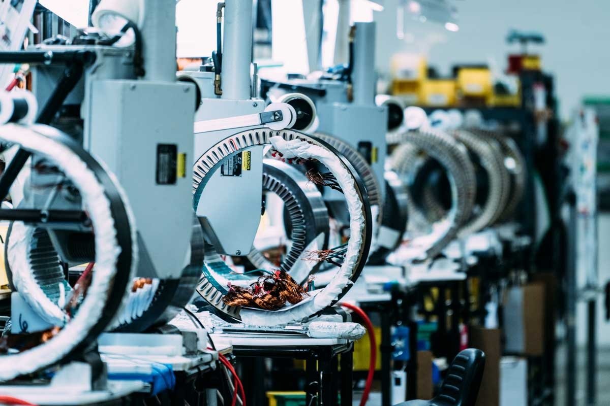 Industrial motor production line showing controlled manufacturing process